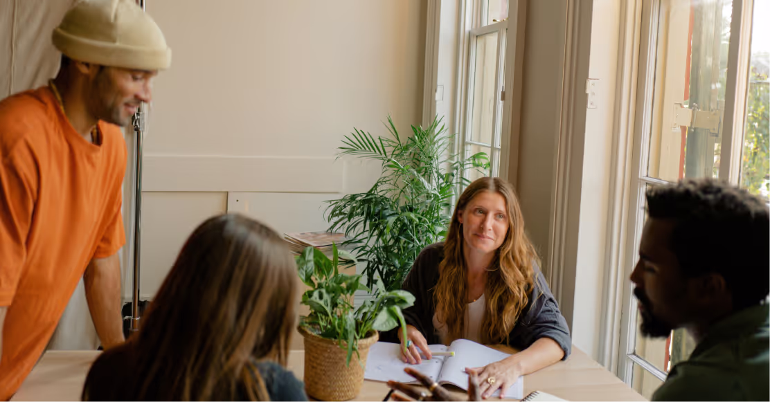 Coworkers talking in the office