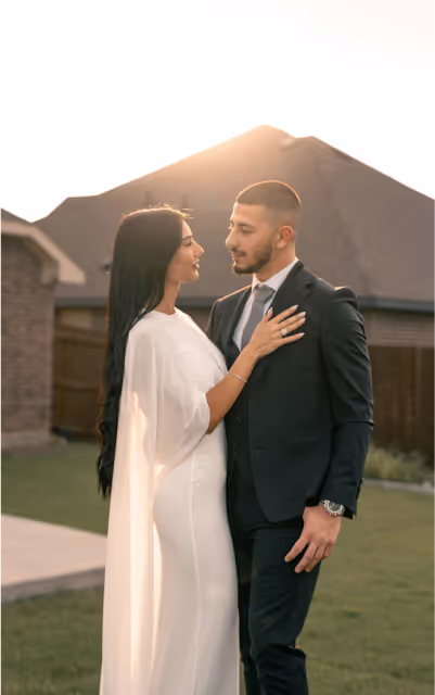 A couple kissing at a wedding